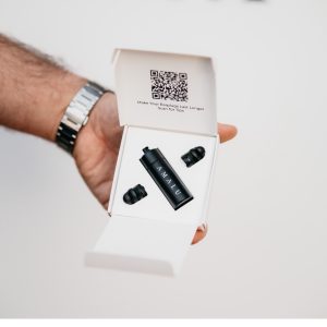 Amalu Music earplugs inside white box on white background